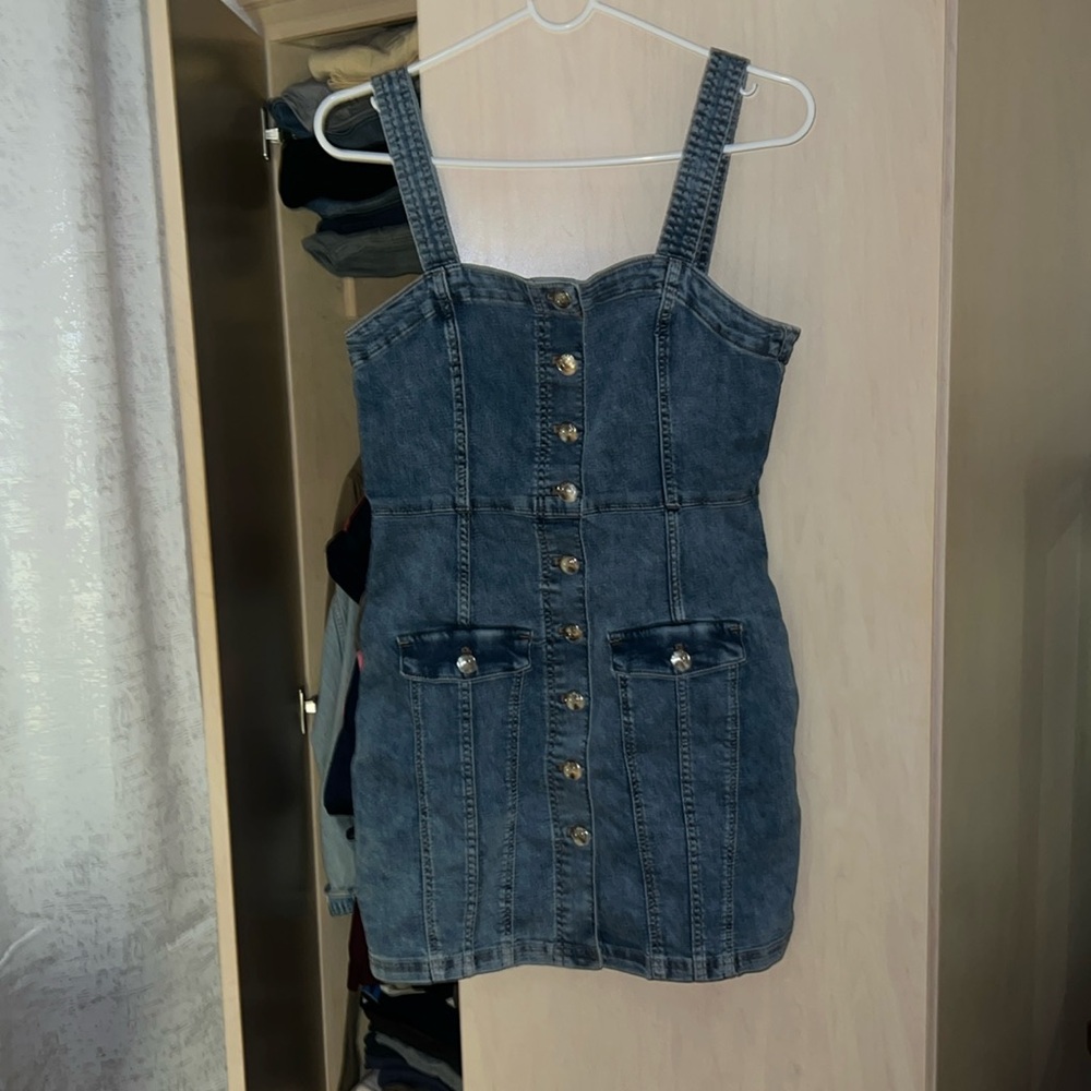 Overall style denim dress.